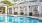 a swimming pool outside of a house