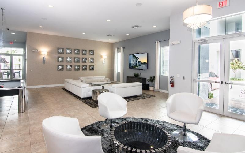 a large living room with a large glass wall